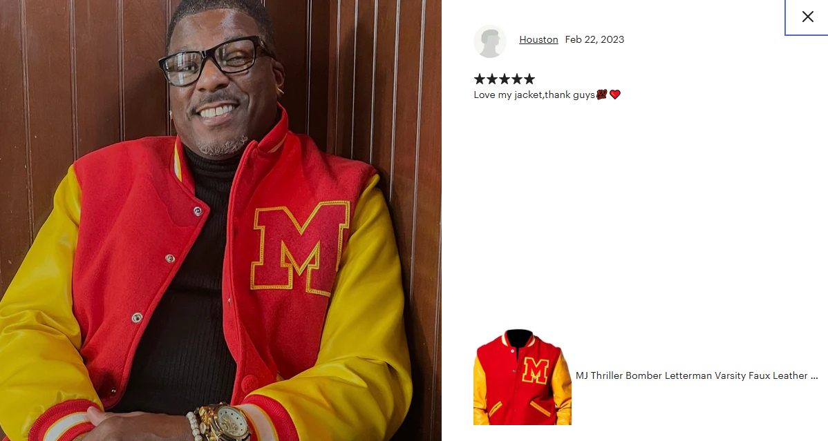 Man wearing MJ thriller red and yellow varsity jacket with a letter 'M' on a wooden background