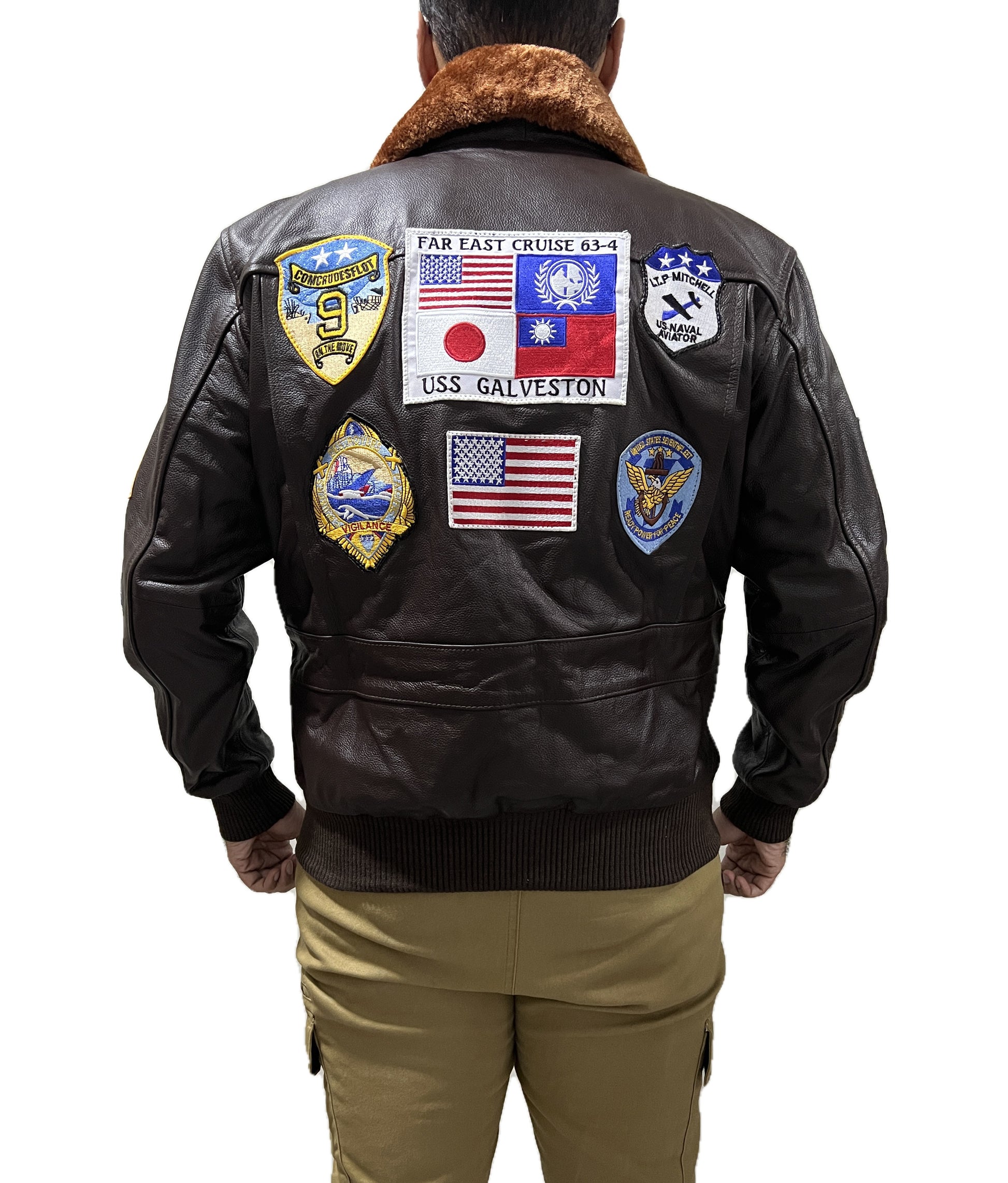 Back view Top Gun pilot bomber jacket with USA flag patches & vintage squadron emblems