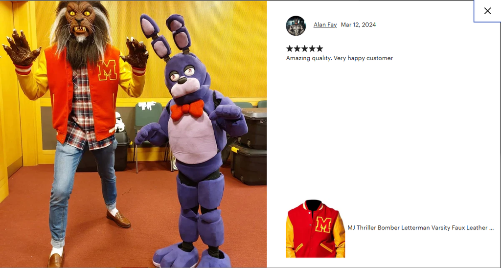 two people in colorful costumes standing in a room with a yellow wall.