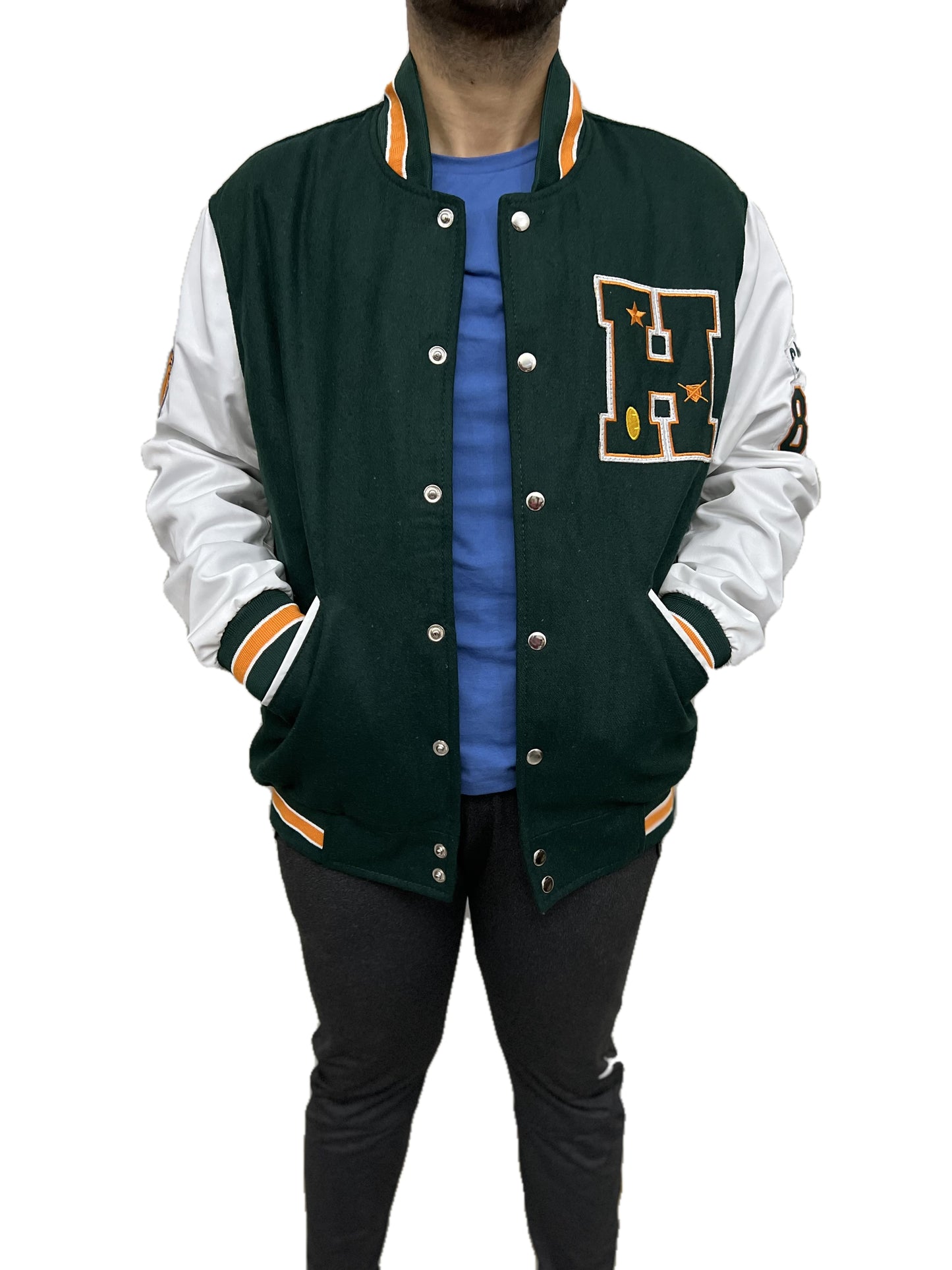 Stranger Things Hawkins High varsity wool jacket with embroidered H patch and white leather sleeves front hands in pocket pose