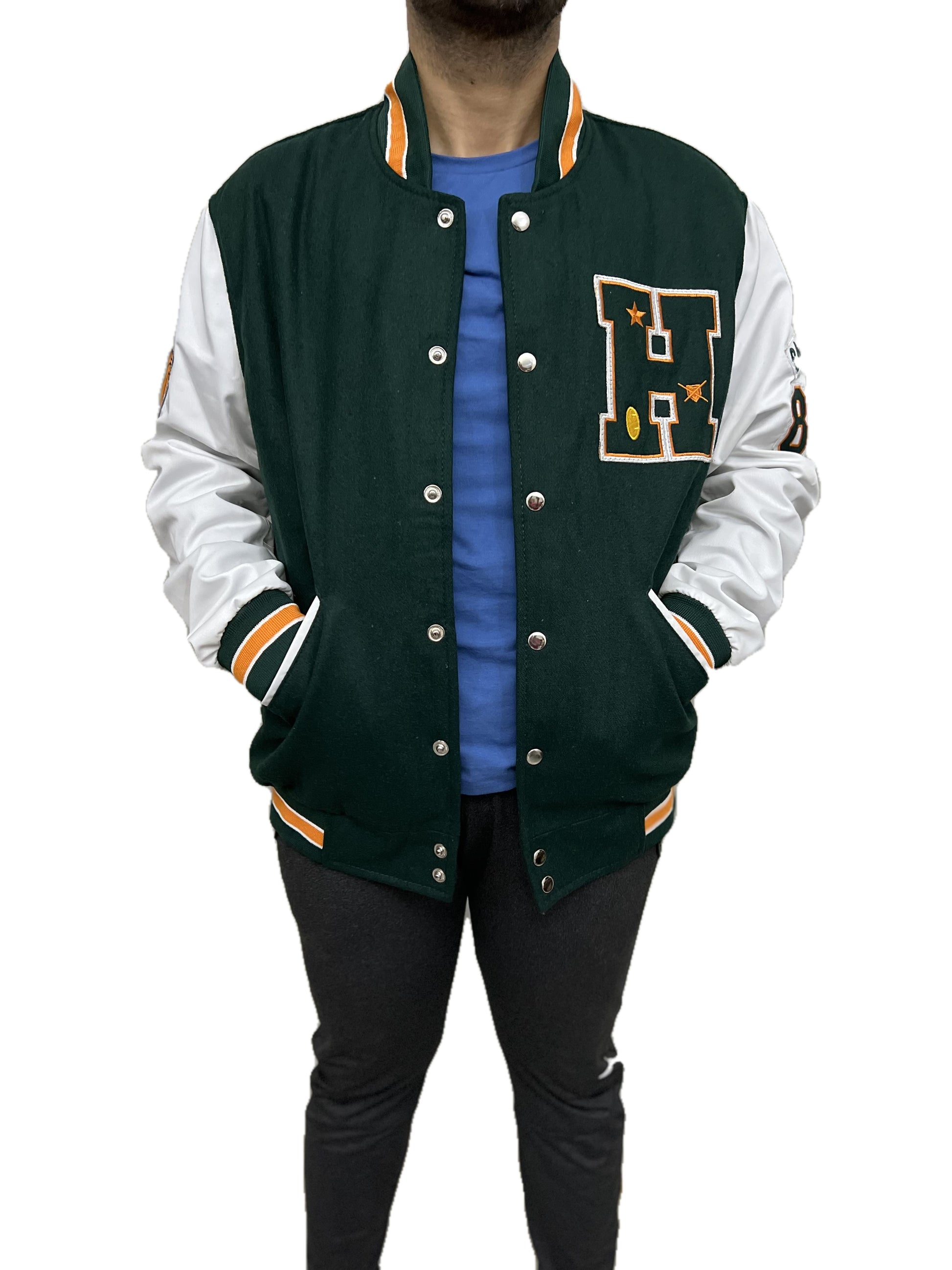 Stranger Things Hawkins High varsity wool jacket with embroidered H patch and white leather sleeves front hands in pocket pose