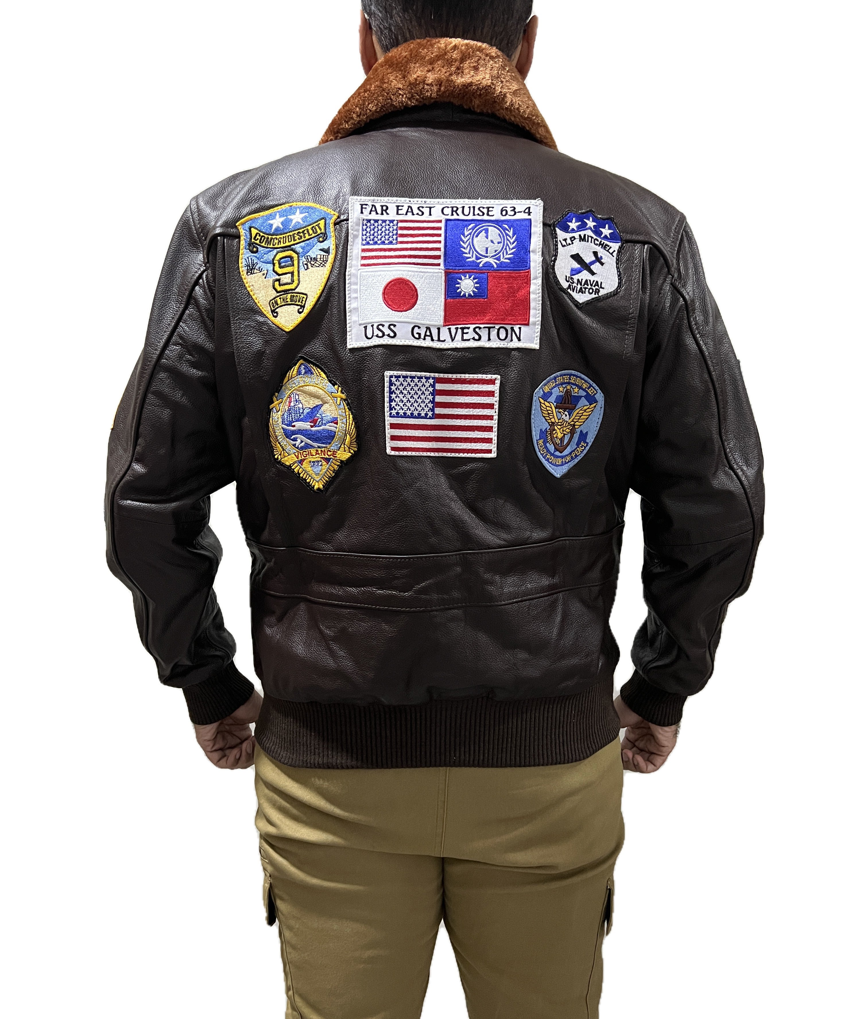 Back view Top Gun pilot bomber jacket with USA flag patches & vintage squadron emblems
