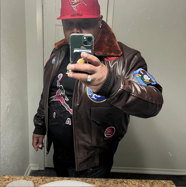 Top Gun Pete Maverick Tom Cruise Air Force Bomber Real Leather Jacket worn by customer showing brown aviator flight jacket with patches and fur collar