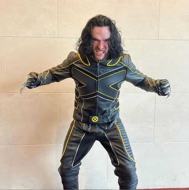Customer wearing X-Men The Last Stand Biker Real Leather Jacket cosplay suit with black leather and yellow detailing.